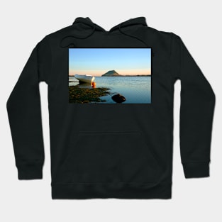 Classic style wooden clinker dinghy on beach. Hoodie